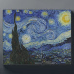 The Starry Night Plaque<br><div class="desc">The Starry Night by Vincent van Gogh The Starry Night is a painting by Dutch post-impressionist artist Vincent van Gogh. The painting depicts the view outside his sanitorium room window at night, although it was painted from memory during the day. The centre part shows the village of Saint-Rémy under a...</div>
