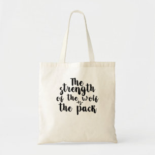 The Strength Of The Wolf Is the Pack Tote Bag