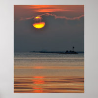 The sun emerges through an off-shore fog bank