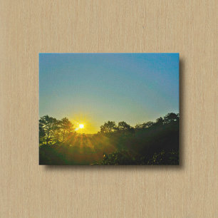 The Sun Over a Mountain Horizon Canvas Print