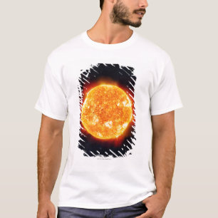 The Sun showing solar flares against a star T-Shirt