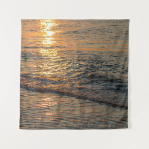 The sunset reflection on the beautiful ocean water tapestry