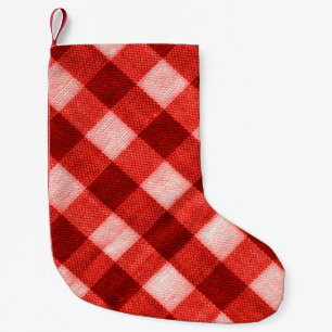 The texture of the bright red of binding gingham f small christmas stocking