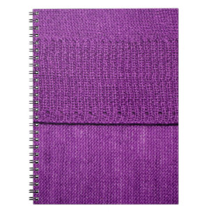 the texture of the knitted fabric, a plain purple  notebook