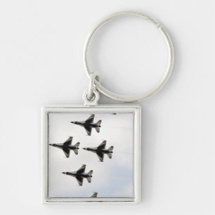 The Thunderbirds form a 6-ship Delta formation Key Ring