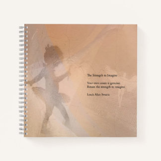 The tiny ballerina graces a notebook. notebook
