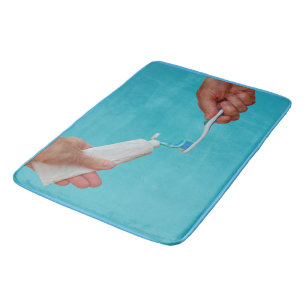 the tube of toothpaste on custom large bath mat