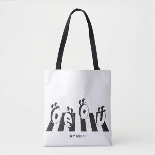 “The Umlauts™ Crossing Over” Tote Bag