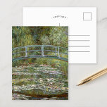 The Water-Lily Pond | Claude Monet Postcard<br><div class="desc">The Water-Lily Pond (1899) by French Impressionist artist Claude Monet. Original fine art painting depicts a garden landscape with water lilies under the Japanese bridge. 

Use the design tools to add custom text or personalise the image.</div>