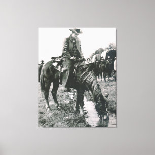 The Watering Hole Cowboy On Horse  Canvas Print