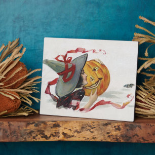 The Witch's Kiss: a Jack o Lantern on Halloween Plaque