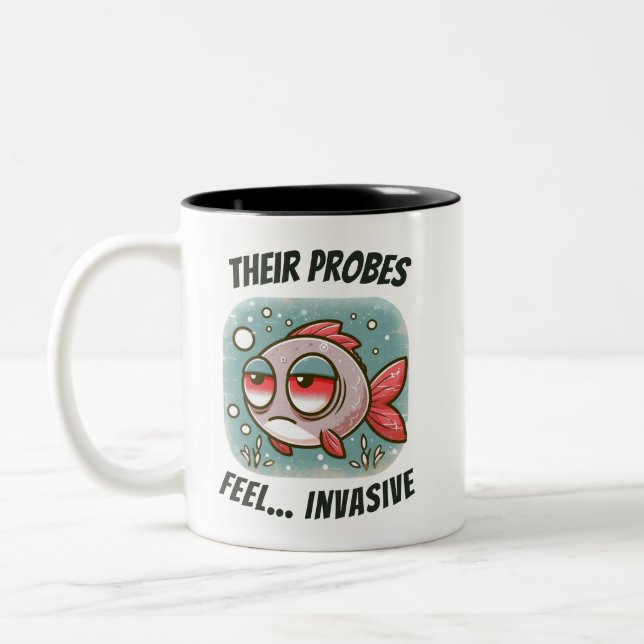 Their probes feel… invasive-  fish Two-Tone coffee mug (Left)