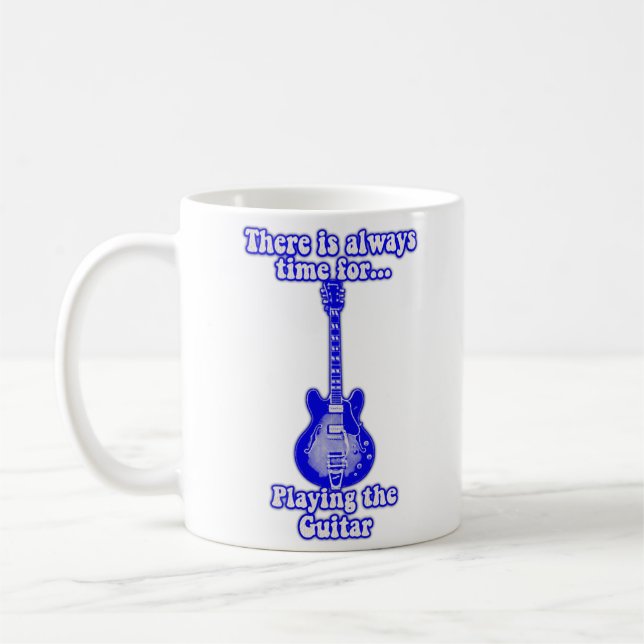 There is always time for playing the guitar. blue coffee mug (Left)