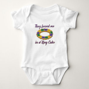 They found me in a King Cake Baby Bodysuit