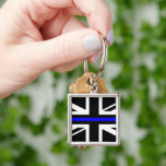 Thin Blue Line - UK Key Ring<br><div class="desc">"Thin blue line" is a term that typically refers to the concept of the police as the line which keeps society from descending into violent chaos.[1] The "blue" in "thin blue line" refers to the blue colour of the uniforms of many police departments.

This is the United Kingdom version.</div>