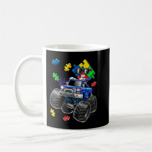 This autism awareness top features a puzzle piece  coffee mug