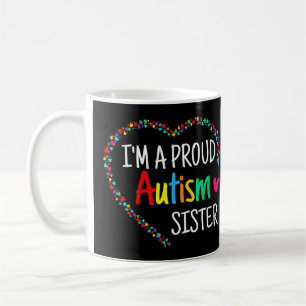 This colorful autism heart made with puzzle pieces coffee mug