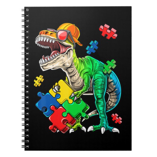 This dinosaur autism awareness top features a dino notebook (Front)