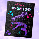 This Girl Loves Gymnastics Jigsaw Puzzle<br><div class="desc">This Girl Loves Gymnastics - This design has a female gymnast silhouette covered in tiny hearts doing a back handspring step out skill! Above her is the words "This girl loves gymnastics" - "gymnastics" is in a purple neon glow effect font while the other words are in a two toned...</div>