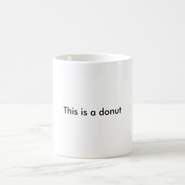 This is a doughnut. Topologically speaking. Coffee Mug (Center)