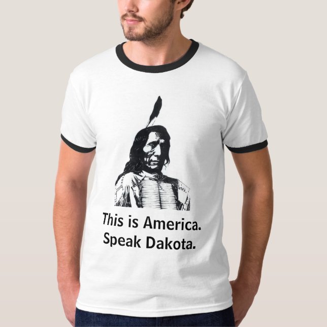 This is America.Speak Dakota. T-Shirt (Front)