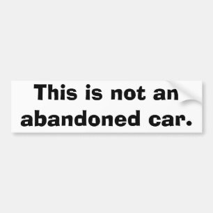 This is not an abandoned car. bumper sticker