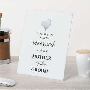 This seat is kindly reserved for the mother of the pedestal sign