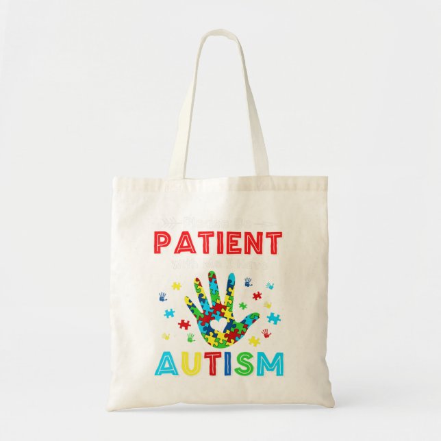 This shirt feature autism puzzle pieces makes the  tote bag (Front)