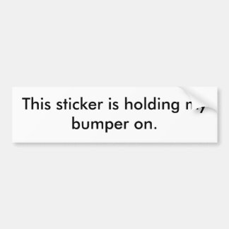 This sticker is holding my bumper on.
