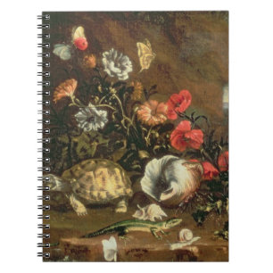 Thistles, flowers, reptiles and butterflies beside spiral notebook