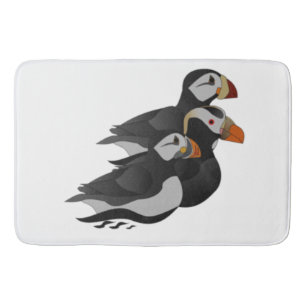 Three Adorably Friendly Puffins Swimming Cartoon Bath Mat
