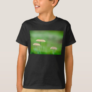 Three beautiful wild mushroom in an autumn field T-Shirt