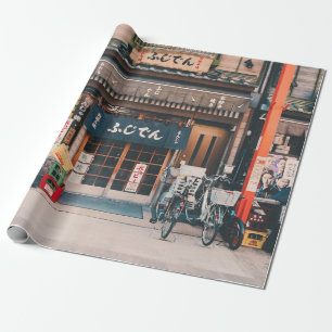 THREE BICYCLES PARKED IN FRONT OF BUILDING WRAPPING PAPER