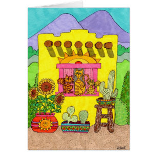 Three Cats in a Yellow Adobe House