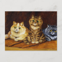Three Cats on a Persian Rug by Louis Wain
