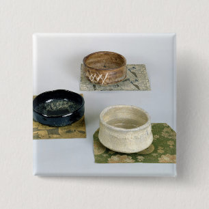 Three chawans used for tea ceremonies, c.1800 15 cm square badge