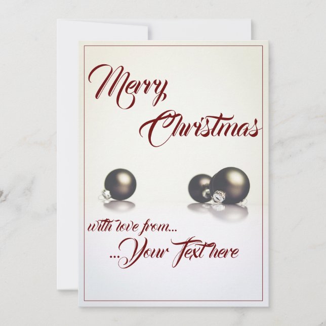 Three christmas balls in front of light background (Front)