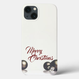 Three christmas balls in front of light background iPhone 13 case