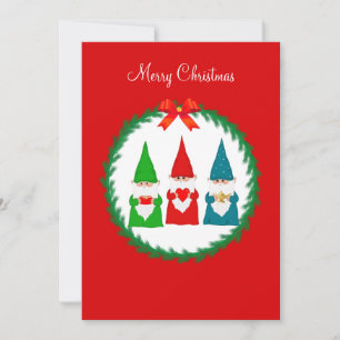 Three Christmas gnomes on red