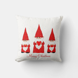 Three Christmas Gnomes on White Cushion