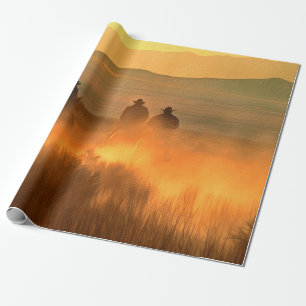 Three cowboy galloping on a background of mountain wrapping paper