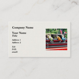 Three Fire Helmets On Fire Truck Business Card