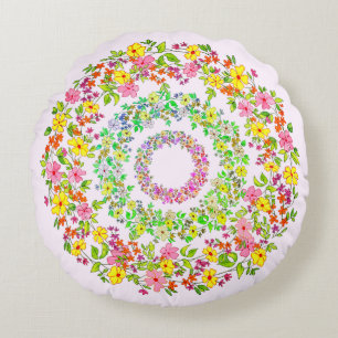 Three floral wreaths round cushion