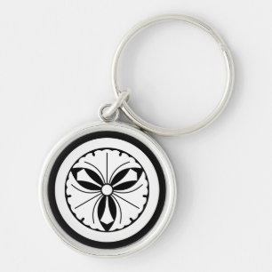 Three ginkgo leaves with swords in circle key ring