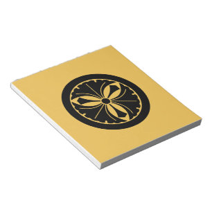 Three ginkgo leaves with swords in circle notepad
