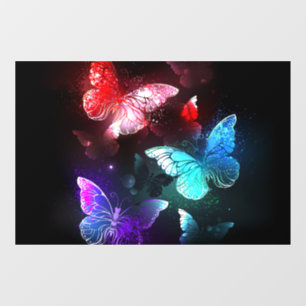 Three Glowing Butterflies on night background