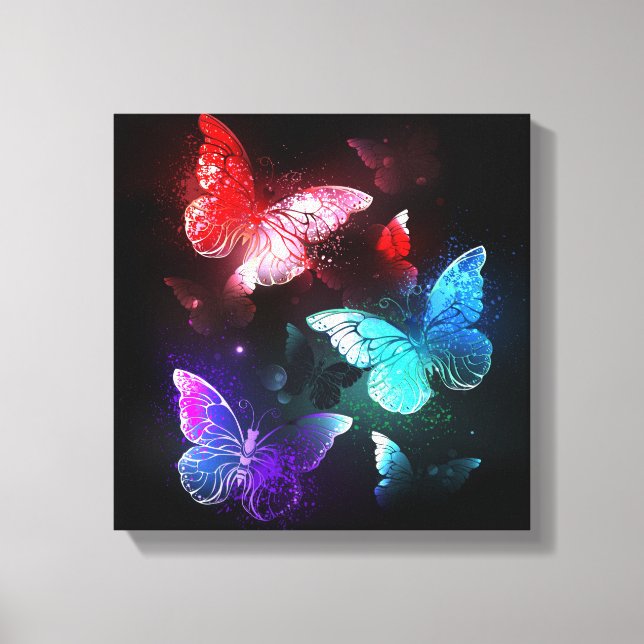 Three Glowing Butterflies on night background Canvas Print (Front)