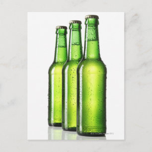 Three green bottles of beer on white background, postcard
