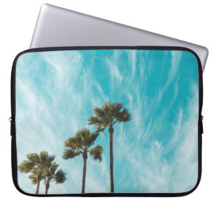 Three green leaf trees below cirus clouds laptop sleeve