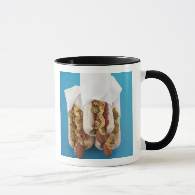 Three hot dogs in buns mug (Right)